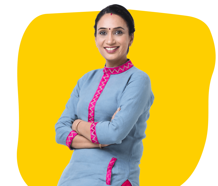 Bengali localisation company UK, An Indian middle-aged woman wearing a salwar, with folded arms and a confident smile.