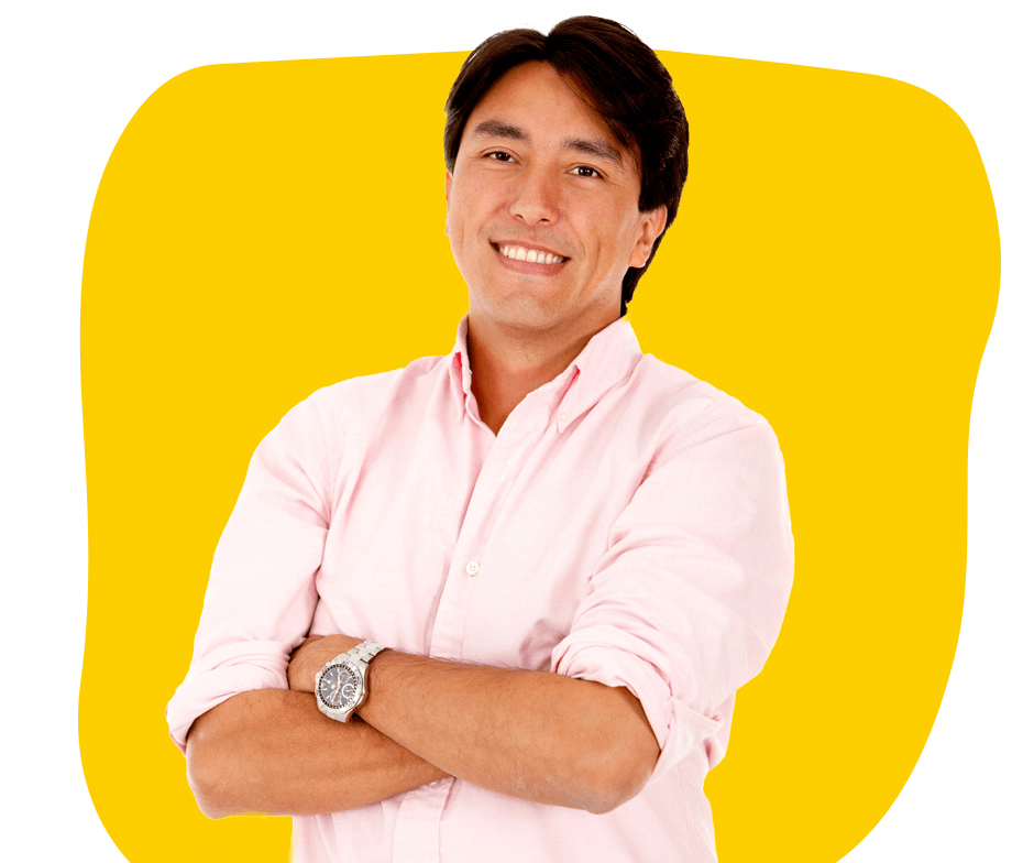 Bolivian Spanish Translation Services UK,Young man in pink shirt smiling confidently with folded arms, representing Bolivian Spanish translation services