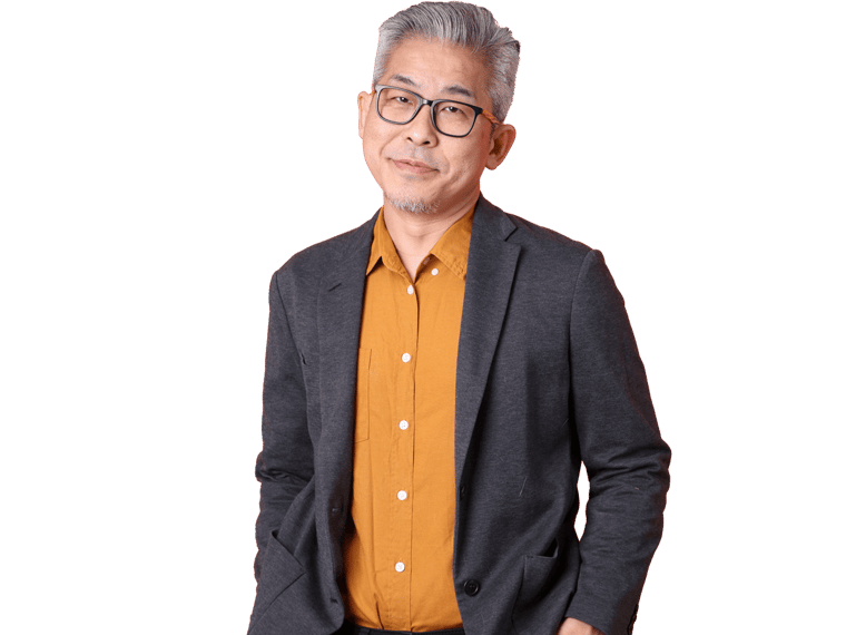 Burmese translation services, The senior Asian business man standing on the orange background.