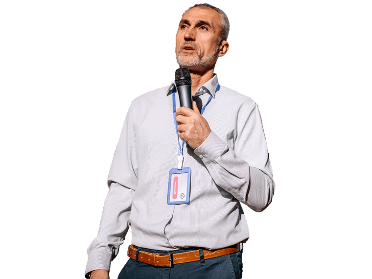 Conference interpreting services, Conference interpreting services expert in a conference holding a microphone