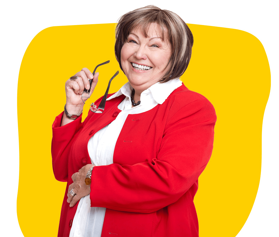 Dutch translation services, An elderly woman wearing a red jacket, holding spectacles, and smiling beautifully