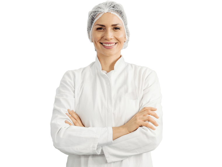 Food label translation services, A young woman chef, wearing a hair cap and a chef uniform, smiling with her hands folded.