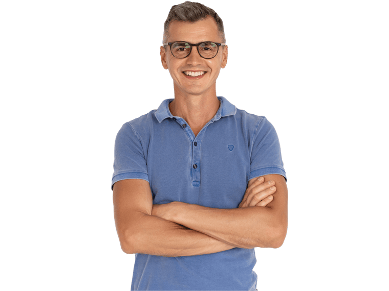 Greek translation services, Portrait of smiling mature man standing with folded arms. 