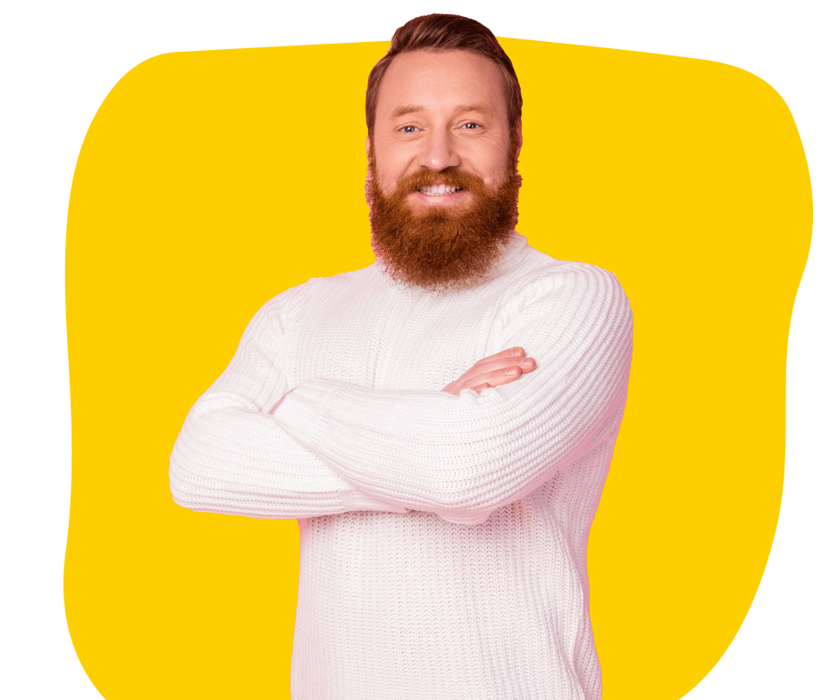 Greek Subtitling Services, A middle-aged man with a long beard, wearing a sweatshirt and standing with his arms folded.