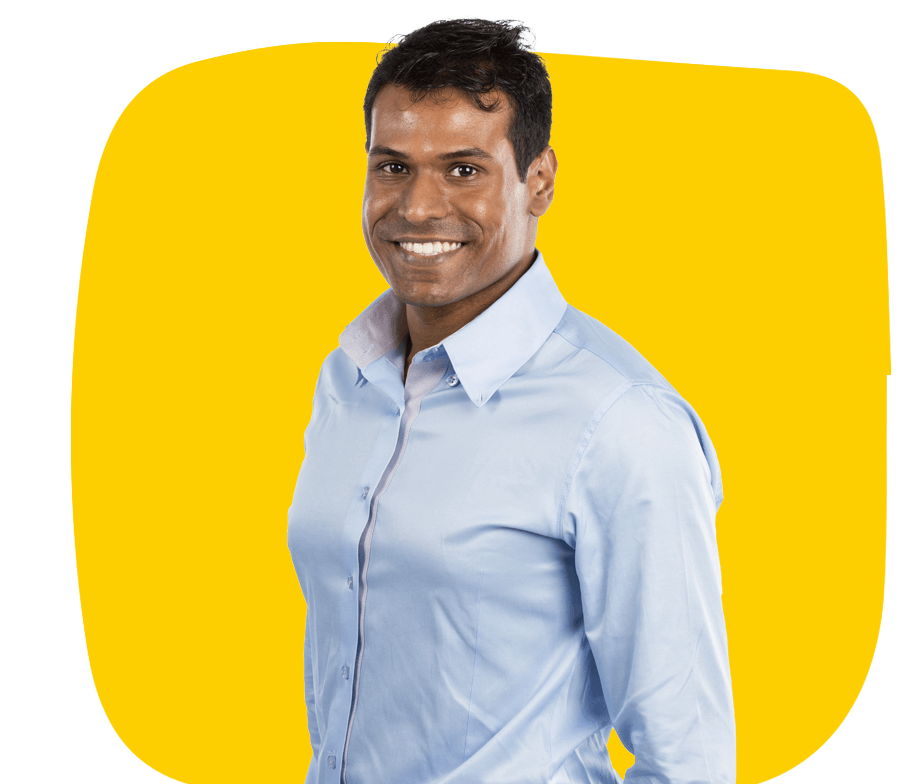 Gujarati-Professional-Translator, A middle-aged Indian man, smiling confidently and wearing a white shirt.