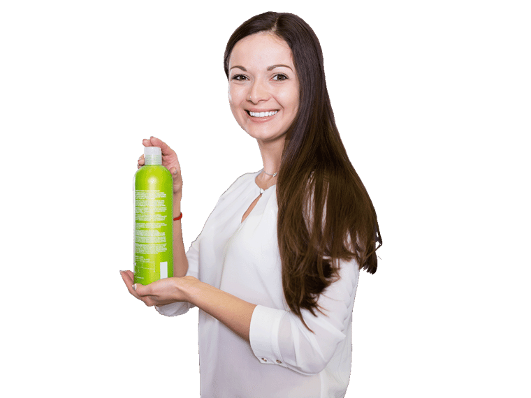 Labels and packaging translation services expert holding a shampoo bottle with labels