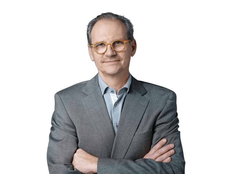 Merger and acquisition translations confident man in a suit and glasses stands with his arms crossed