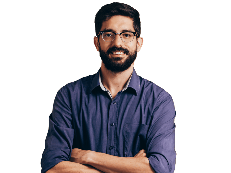 Mexican spanish translation services expert smiling with crossed arms wearing a blue shirt