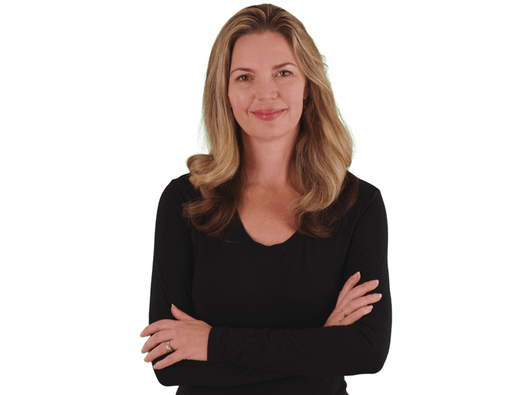 Moldovan translation services, Attractive blonde middle aged woman smiling with arms crossed on green screen