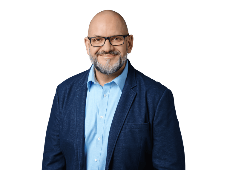 Non-disclosure agreements, man with glasses wearing a blue shirt