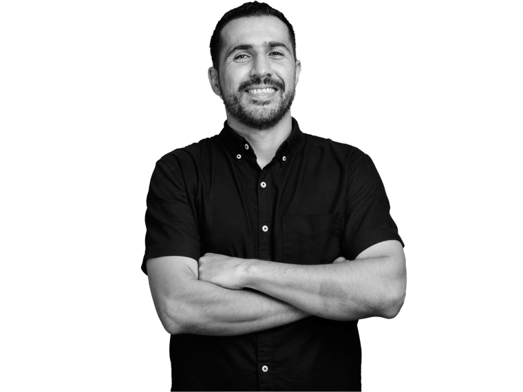 Pashto translation services bearded man wearing a black shirt