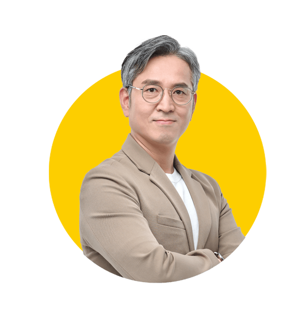 Uzbek translation services by Absolute Translations, middle-aged man in suit expressing emotions with facial expressions and hand gestures.