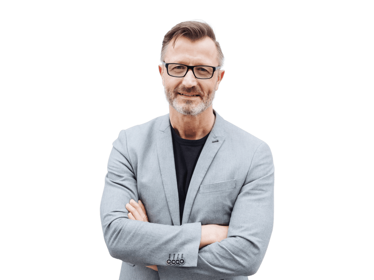 Pr translation services man in a gray suit and glasses stands confidently with his arms crossed.