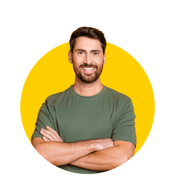 Professional Kazakh translation services by Absolute Translations, cheerful young man with folded hands and a bright smile wearing stylish khaki clothing.