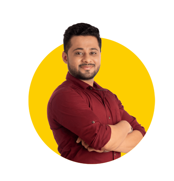 Professional Indian translation services by Absolute Translations, happy young man posing with arms crossed against white background.