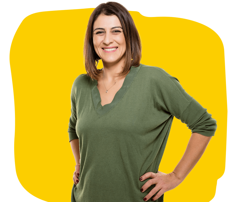 Translation services london, A woman from London wearing a green T-shirt, smiling beautifully.