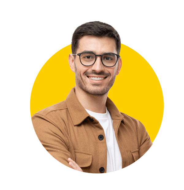 Spanish translation services by Absolute Translations, young Hispanic man wearing brown shirt and glasses, looking at the camera.