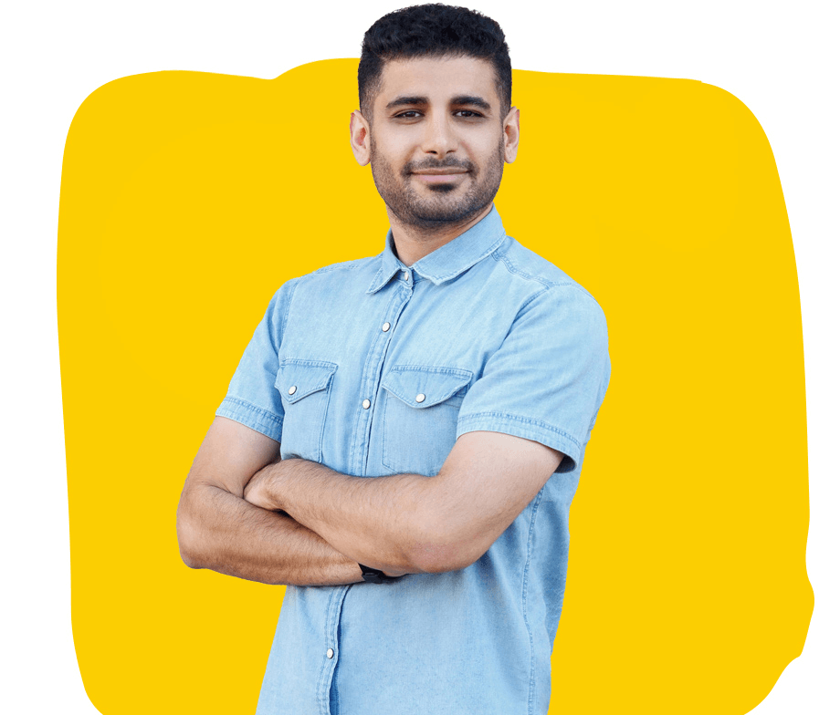 Turkish proofreading services, A young Turkish man wearing a denim shirt, standing confidently.