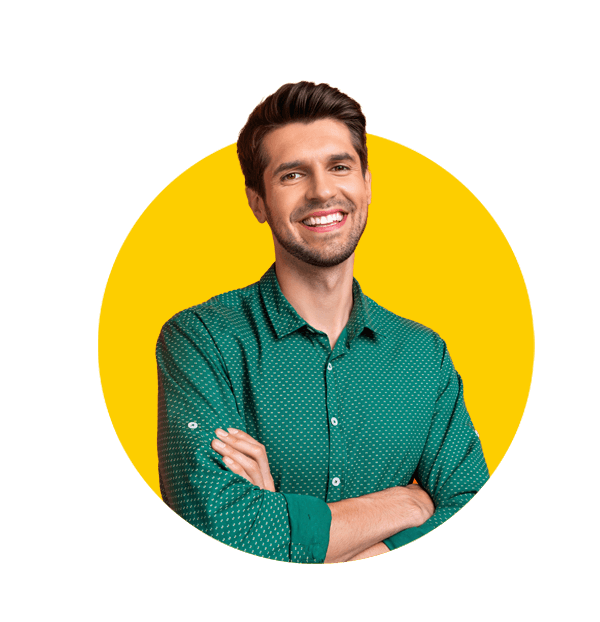 Professional Greek translation services by Absolute Translations, confident businessman in green formal shirt with folded arms, representing expert translation solutions