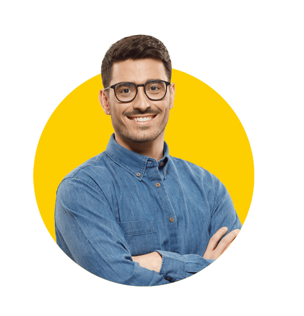 Professional Guarani translations by Absolute Translations, confident young businessman wearing glasses and blue shirt looking at camera.