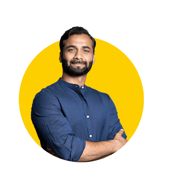 Professional Gujarati translations by Absolute Translations, proud Indian businessman and investor standing confidently, showcasing expert language support