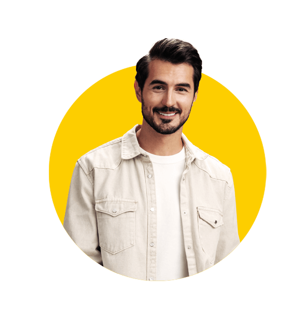 Professional Icelandic translation services by Absolute Translations, stylish man smiling in white t-shirt and business jacket against beige background.