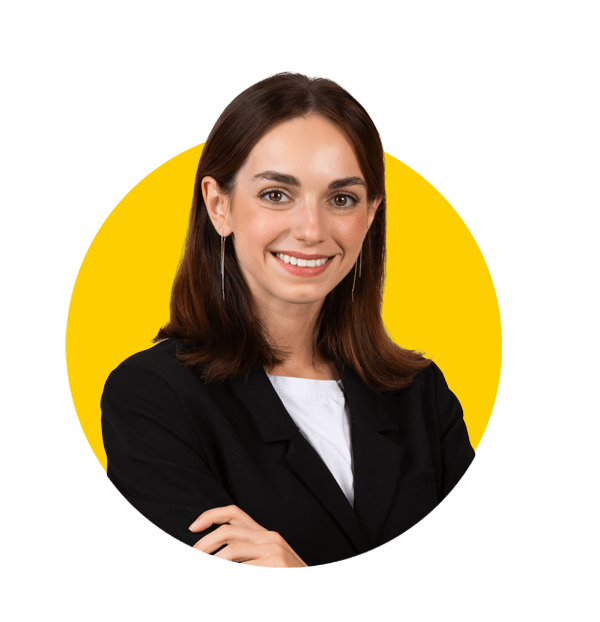 Professional Luxembourgish translation services by Absolute Translations, confident young Caucasian businesswoman with a pleasant smile.