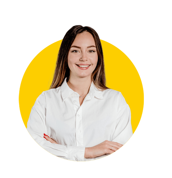 Professional Moldovan translation services by Absolute Translations, Caucasian businesswoman in white shirt with folded hands at office desk on gray background.