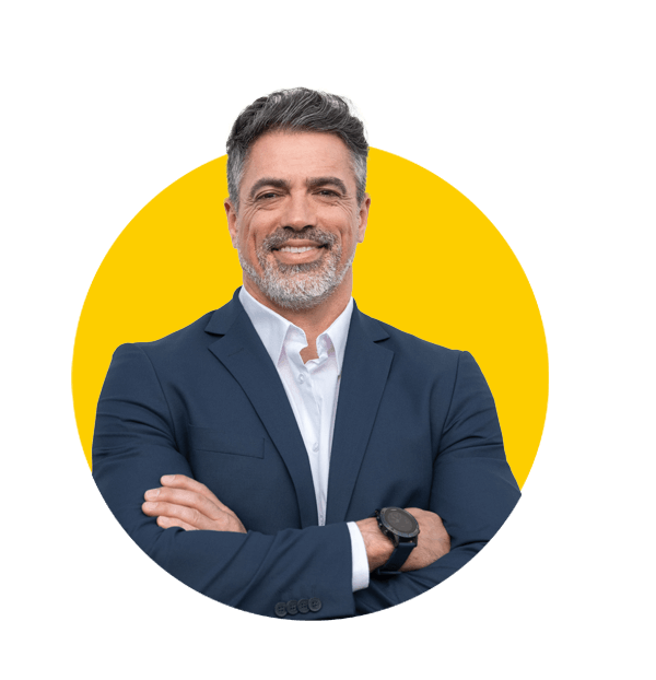 Persian translation services by Absolute Translations, smiling confident mature Latin Hispanic businessman standing with arms crossed.