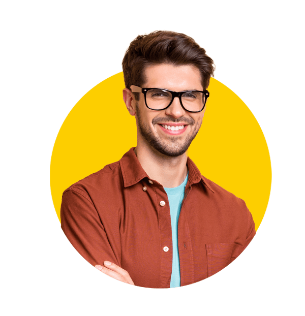 Turkmen translation services by Absolute Translations, cheerful brown-haired man smiling confidently in portrait.