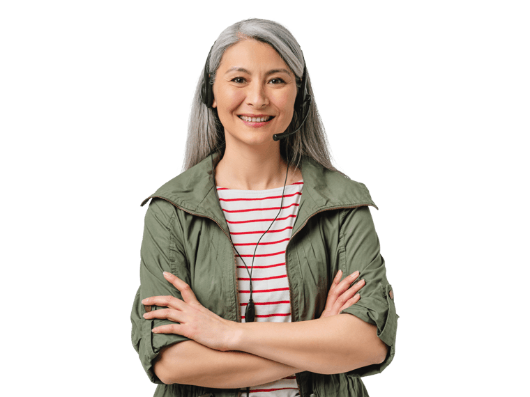 Telephone interpreting services, A middle-aged woman interpreter wearing a headset and a jacket, smiling with her arms folded.