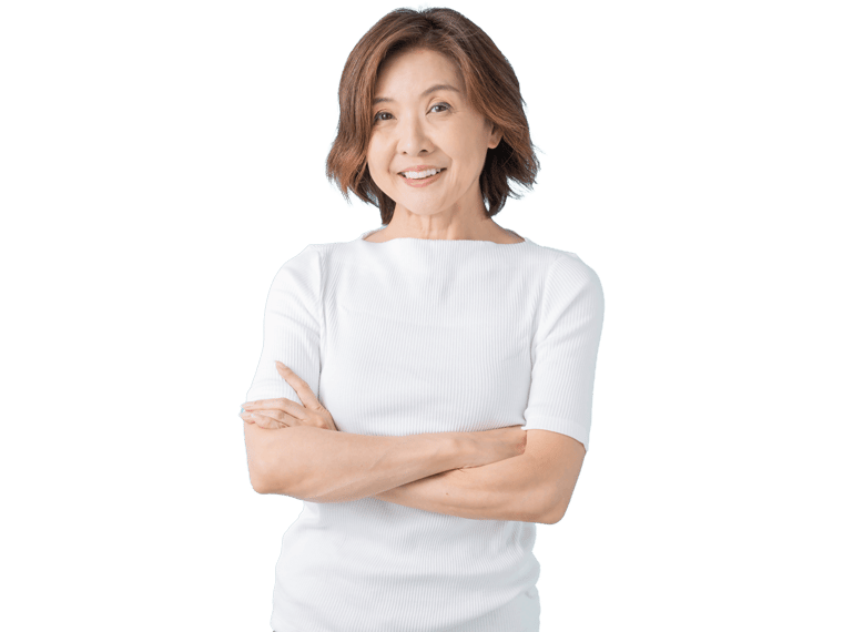 Traditional chinese translation services woman stands confidently, smiling warmly, with her arms crossed in front of her.