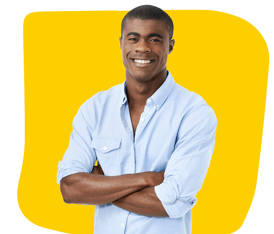 Twi Proofreading services Uk, A young African man smiling and wearing a blue-colored shirt.