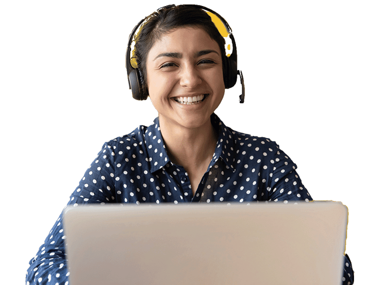 Urdu Interpreting Services professional smiling and working on laptop wearing a headset