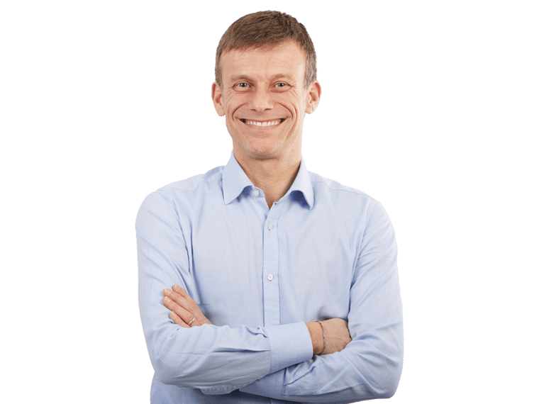 Will probate translation expert with long sleeve light blue polo smiling