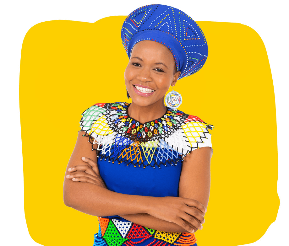Zulu TranslationServices, A Zulu woman dressed in traditional attire, smiling with her arms folded.