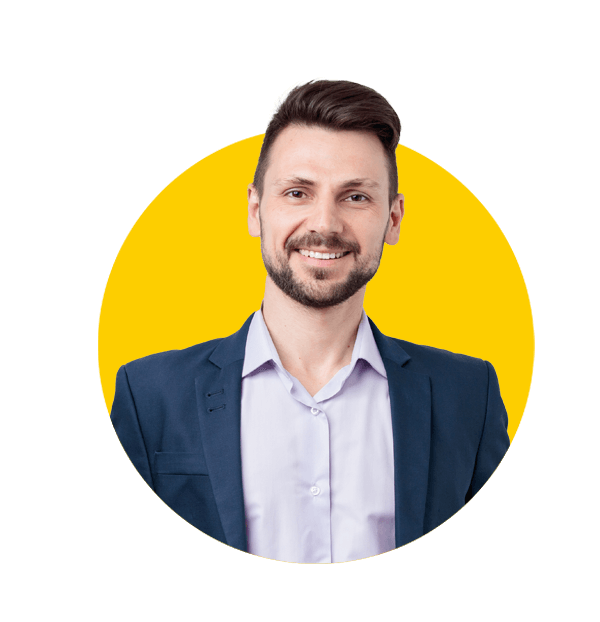 Business plan translation uk, Image of happy brunette man wearing suit smiling at camera with hands in pockets isolated over gray background.