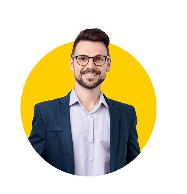 Company incorporation translations uk, Handsome man in a suit keeps his hands in his pockets.