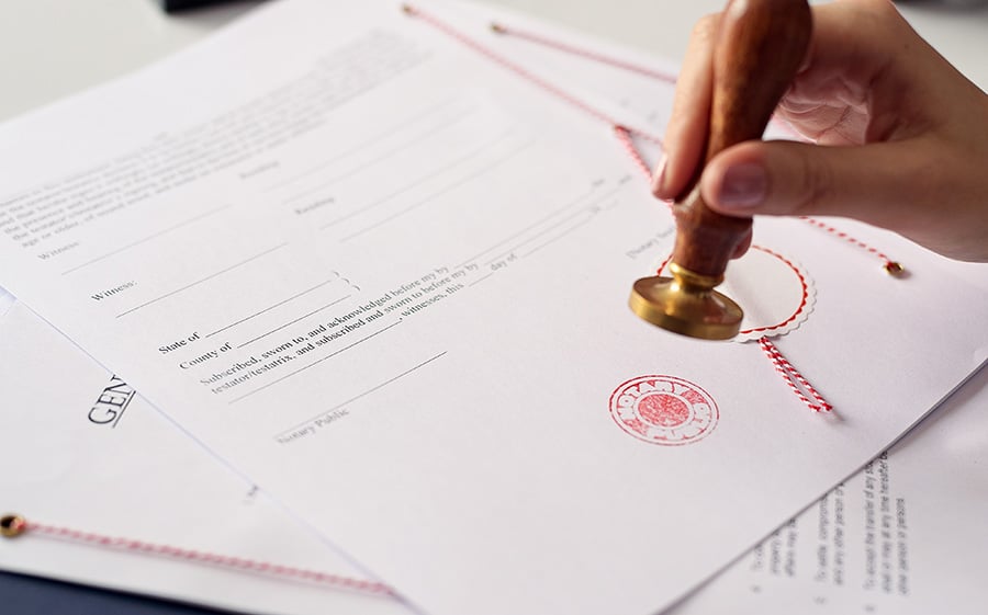 Degree Translationservices Certificate with signed statement and official company stamp.