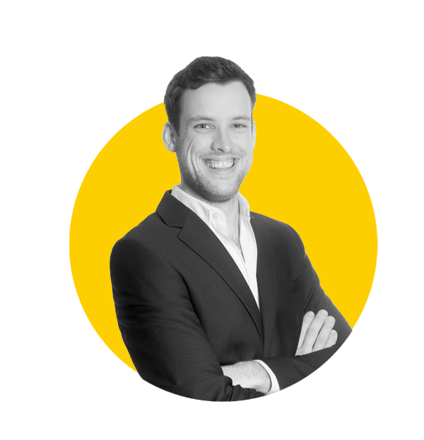 Dutch translations, Portrait of a young business man in front of white studio background,