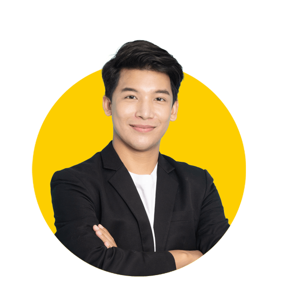 Professional Khmer translation services by Absolute Translations, smiling young Asian businessman with arms crossed against green background