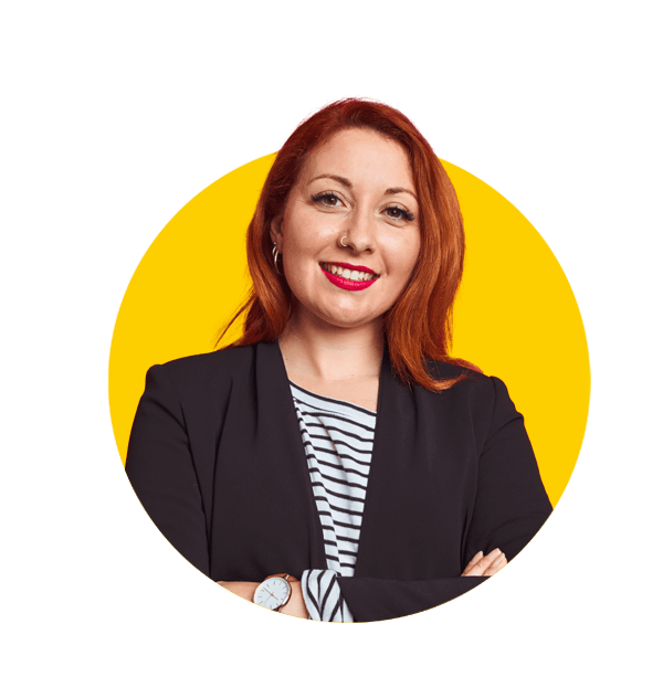 Professional Laotian translation services by Absolute Translations, beautiful redhead businesswoman wearing elegant jacket against red background