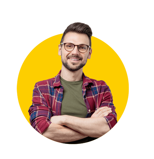 Professional Latin translation services by Absolute Translations, handsome young man in casual shirt smiling with arms crossed on grey background