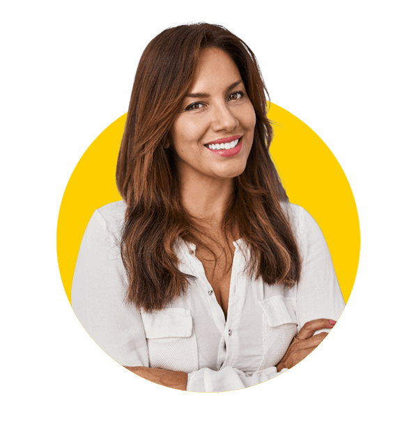 Latvian professional translation services by Absolute Translations, happy Hispanic woman standing with crossed arms and smiling at the camera.