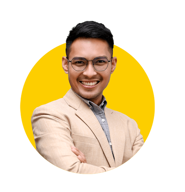 Nepalese translation services by Absolute Translations, confident adult Asian businessman in formal suit with arms crossed.