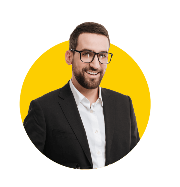 Patent translaiton services by Absolute translations, Image of young happy businessman over white background using laptop computer.