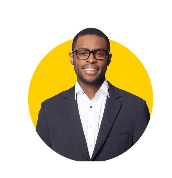 Professional Somali translation services by Absolute Translations, smiling African American millennial businessman in glasses, posing on grey studio background.