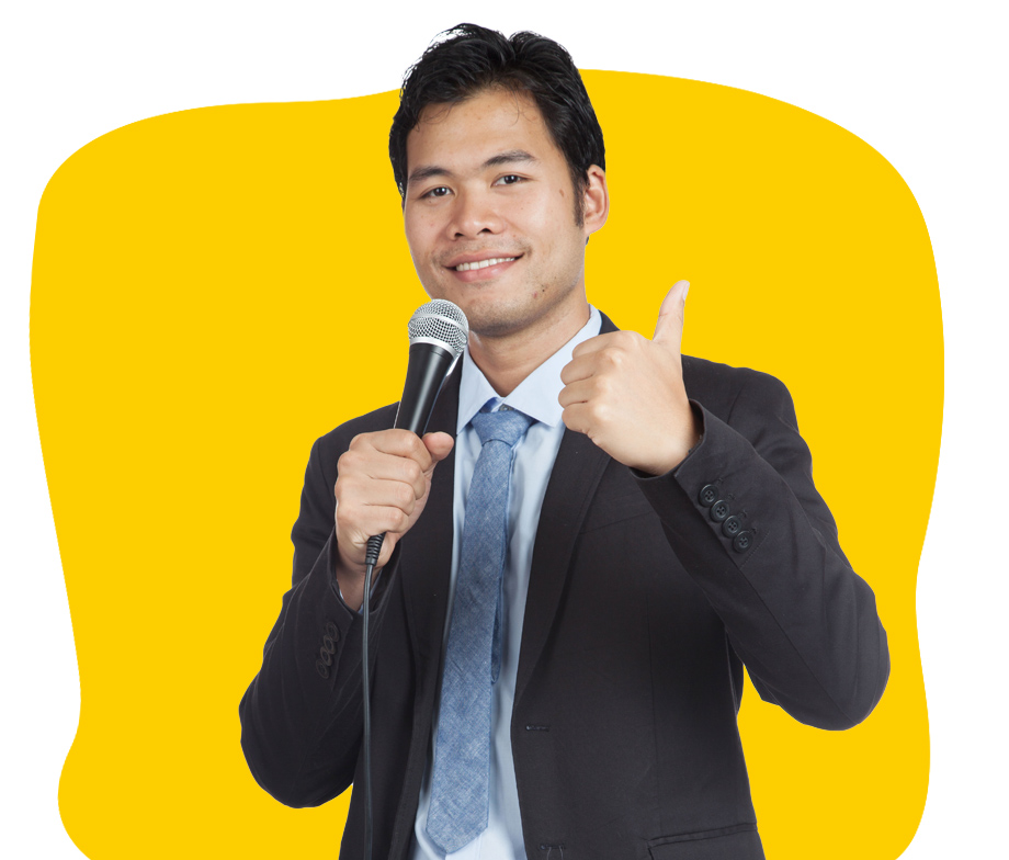 Bahasa Indonesian interpreter smiling with thumps up sign holding a microphone ready for interpreting