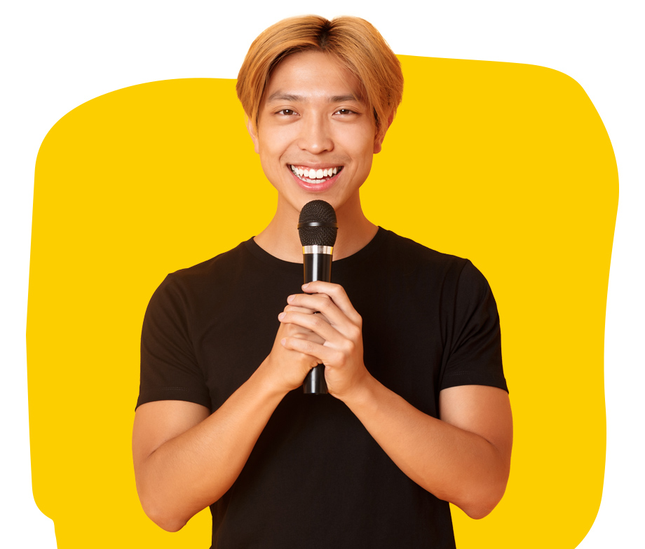 Cantonese Interpreter confidently smiling holding a microphone wearing a black shirt