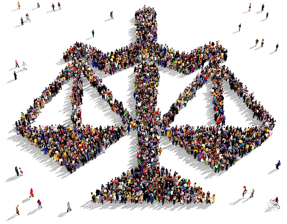 Dutch legal translation company represented by Large group of people seen from above gathered together in the shape of scales of justice icon
